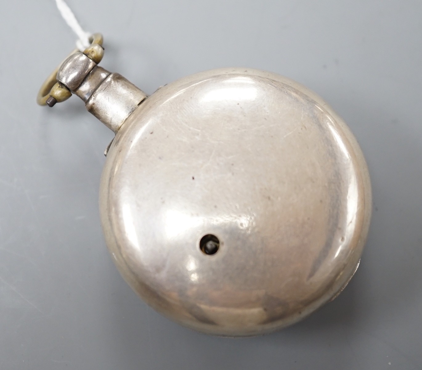 A George IV silver pair cased keywind verge pocket watch, by Thomas Phillips of Ludlow, with two Roman dials, case diameter 56mm.